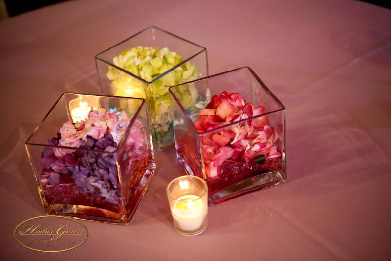 The hydrangea centerpieces coordinated with the same shades of purple rose